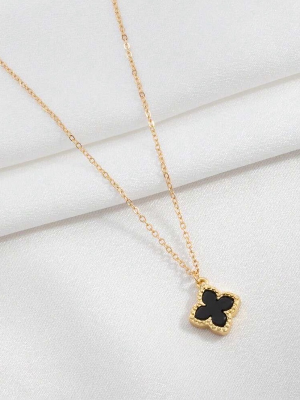 Gold Tone and Black Clover Pendant Necklace